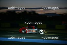 09.06.2010 Le Mans, France, #80 Flying Lizard Motorsport Porsche 911 GT3 RSR: Seth Neiman, Darren Law, Joerg Bergmeister - 24 Hour of Le Mans 2010