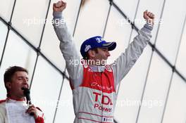 04-11.06.2010 Le Mans, France, Race winner Romain Dumas celebrates on the podium - 24 Hour of Le Mans 2010