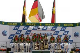 04-11.06.2010 Le Mans, France, LMP1 podium: class and overall winners Mike Rockenfeller, Romain Dumas and Timo Bernhard celebrate with Dr. Wolfgang Ullrich, second place Andre Lotterer, Marcel Faessler and Benoit Treluyer, third place Tom Kristensen, Rinaldo Capello and Allan McNish - 24 Hour of Le Mans 2010
