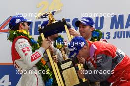 04-11.06.2010 Le Mans, France, LMP1 podium: class and overall winners Mike Rockenfeller, Romain Dumas and Timo Bernhard celebrate with Dr. Wolfgang Ullrich - 24 Hour of Le Mans 2010