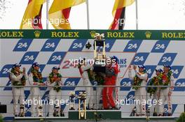 04-11.06.2010 Le Mans, France, LMP1 podium: class and overall winners Mike Rockenfeller, Romain Dumas and Timo Bernhard celebrate with Dr. Wolfgang Ullrich, second place Andre Lotterer, Marcel Faessler and Benoit Treluyer, third place Tom Kristensen, Rinaldo Capello and Allan McNish - 24 Hour of Le Mans 2010