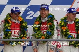 04-11.06.2010 Le Mans, France, LMP1 podium: second place Andre Lotterer, Marcel Faessler and Benoit Treluyer - 24 Hour of Le Mans 2010