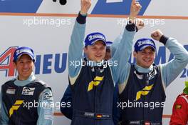 04-11.06.2010 Le Mans, France, LMGT2 podium: class winners Marc Lieb, Richard Lietz and Wolf Henzler - 24 Hour of Le Mans 2010