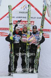 17.12.2010, Engelberg, Switzerland (SUI): (L-R): Andreas Kofler (AUT), Fischer, Thomas Morgenstern (AUT), Fischer, Wolfgang Loitzl (AUT), Elan - FIS world cup ski jumping, replacing Harrachov, Engelberg (SUI). www.xpb.cc. © Manzoni/xpb.cc. Every downloaded picture is fee-liable.