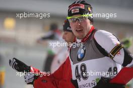 07.01.2011, Oberhof, Germany (GER): Dominik Landertinger (AUT), Fischer, Rottefella, Leki - IBU world cup biathlon, sprint men, Oberhof (GER). www.xpb.cc. © Manzoni/xpb.cc. Every downloaded picture is fee-liable.