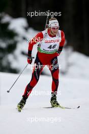12.01.2011, Ruhpolding, Germany (GER): Alexander Os (NOR), Fischer, Rottefella, Swix, Odlo - IBU world cup biathlon, individual men, Ruhpolding (GER). www.xpb.cc. © Manzoni/xpb.cc. Every downloaded picture is fee-liable.