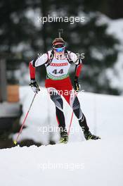 12.01.2011, Ruhpolding, Germany (GER): Dominik Landertinger (AUT), Fischer, Rottefella, Leki - IBU world cup biathlon, individual men, Ruhpolding (GER). www.xpb.cc. © Manzoni/xpb.cc. Every downloaded picture is fee-liable.