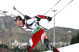 12.01.2011, Ruhpolding, Germany (GER): Simon Eder (AUT), Fischer, Rottefella, Swix - IBU world cup biathlon, individual men, Ruhpolding (GER). www.xpb.cc. © Manzoni/xpb.cc. Every downloaded picture is fee-liable.
