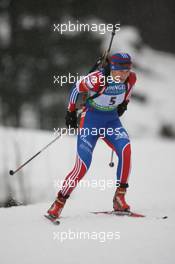 13.01.2011, Ruhpolding, Germany (GER): Olga Zaitseva (RUS), Madshus, Rottefella, Alpina, Swix, adidas - IBU world cup biathlon, individual women, Ruhpolding (GER). www.xpb.cc. © Manzoni/xpb.cc. Every downloaded picture is fee-liable.