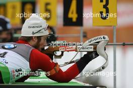 14.01.2011, Ruhpolding, Germany (GER): Alexander Os (NOR), Fischer, Rottefella, Swix, Odlo - IBU world cup biathlon, sprint men, Ruhpolding (GER). www.xpb.cc. © Manzoni/xpb.cc. Every downloaded picture is fee-liable.