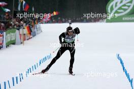 14.01.2011, Ruhpolding, Germany (GER): Simon Hallenbarter (SUI), Madshus, Rottefella, KV+, ODLO - IBU world cup biathlon, sprint men, Ruhpolding (GER). www.xpb.cc. © Manzoni/xpb.cc. Every downloaded picture is fee-liable.