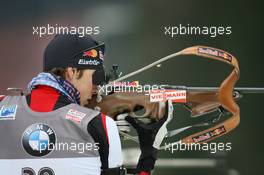 14.01.2011, Ruhpolding, Germany (GER): Tobias Eberhard (AUT), Fischer, Rottefella, Swix - IBU world cup biathlon, sprint men, Ruhpolding (GER). www.xpb.cc. © Manzoni/xpb.cc. Every downloaded picture is fee-liable.