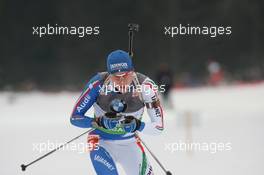 14.01.2011, Ruhpolding, Germany (GER): Lukas Hofer (ITA), Rossignol, Rottefella, Exel - IBU world cup biathlon, sprint men, Ruhpolding (GER). www.xpb.cc. © Manzoni/xpb.cc. Every downloaded picture is fee-liable.