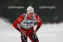 14.01.2011, Ruhpolding, Germany (GER): Lars Berger (NOR), Madshus, Salomon, Swix, Odlo - IBU world cup biathlon, sprint men, Ruhpolding (GER). www.xpb.cc. © Manzoni/xpb.cc. Every downloaded picture is fee-liable.