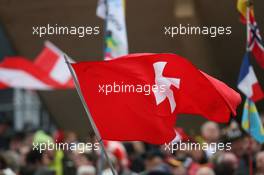 14.01.2011, Ruhpolding, Germany (GER): Biathlon Feature: waving swiss flag - IBU world cup biathlon, sprint men, Ruhpolding (GER). www.xpb.cc. © Manzoni/xpb.cc. Every downloaded picture is fee-liable.