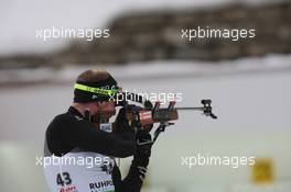 14.01.2011, Ruhpolding, Germany (GER): Christian Stebler (SUI), Rossignol, Rottefella, ODLO - IBU world cup biathlon, sprint men, Ruhpolding (GER). www.xpb.cc. © Manzoni/xpb.cc. Every downloaded picture is fee-liable.