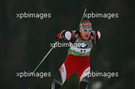 14.01.2011, Ruhpolding, Germany (GER): Simon Eder (AUT), Fischer, Rottefella, Swix - IBU world cup biathlon, sprint men, Ruhpolding (GER). www.xpb.cc. © Manzoni/xpb.cc. Every downloaded picture is fee-liable.