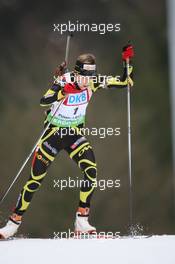15.01.2011, Ruhpolding, Germany (GER): Marie Laure Brunet (FRA), Rossignol, Rottefella, Swix - IBU world cup biathlon, sprint women, Ruhpolding (GER). www.xpb.cc. © Manzoni/xpb.cc. Every downloaded picture is fee-liable.