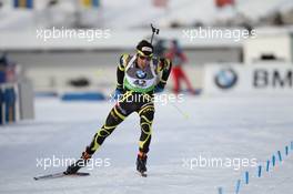 20.01.2011, Antholz, Italy (ITA): Martin Fourcade (FRA), Rossignol, Rottefella, OneWay, Odlo - IBU world cup biathlon, sprint men, Antholz (ITA). www.xpb.cc. © Manzoni/xpb.cc. Every downloaded picture is fee-liable.