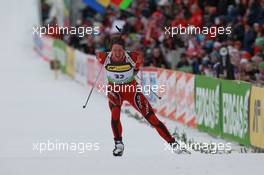 17.03.2011, Holmenkollen, Norway (NOR): Lars Berger (NOR), Madshus, Salomon, Swix, Odlo - IBU world cup biathlon, sprint men, Holmenkollen (NOR). www.xpb.cc. © Manzoni/xpb.cc. Every downloaded picture is fee-liable.