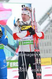 17.03.2011, Holmenkollen, Norway (NOR): Emil Hegle Svendsen (NOR), Madshus, Rottefella, Swix, Odlo - IBU world cup biathlon, sprint men, Holmenkollen (NOR). www.xpb.cc. © Manzoni/xpb.cc. Every downloaded picture is fee-liable.