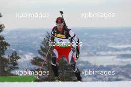 17.03.2011, Holmenkollen, Norway (NOR): Daniel Mesotitsch (AUT), Fischer, Rottefella, Leki - IBU world cup biathlon, sprint men, Holmenkollen (NOR). www.xpb.cc. © Manzoni/xpb.cc. Every downloaded picture is fee-liable.