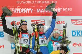 09.03.2011, Khanty-Mansiysk, Russia (RUS): (L-R): Tina Bachmann (GER), Fischer, Rottefella, Swix, adidas , Helena Ekholm (SWE), Fischer, Rottefella, Leki, adidas, Vita Semerenko (UKR), Fischer, Salomon, Swix - IBU world championships biathlon, individual women, Khanty-Mansiysk (RUS). www.xpb.cc. © Manzoni/xpb.cc. Every downloaded picture is fee-liable.