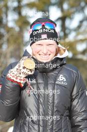 03.03.2011, Khanty-Mansiysk, Russia (RUS): Tora Berger (NOR), Fischer, Rottefella, Odlo - IBU world championships biathlon, medals, Khanty-Mansiysk (RUS). www.xpb.cc. © Manzoni/xpb.cc. Every downloaded picture is fee-liable.