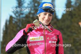 03.03.2011, Khanty-Mansiysk, Russia (RUS): Marie Laure Brunet (FRA), Rossignol, Rottefella, Swix - IBU world championships biathlon, medals, Khanty-Mansiysk (RUS). www.xpb.cc. © Manzoni/xpb.cc. Every downloaded picture is fee-liable.