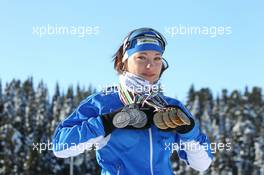 02.03.2011, Khanty-Mansiysk, Russia (RUS): Dorothea Wierer (ITA), Rossignol, Rottefella, Casco with her four gold and three silver medals from the Junior World Championships and the European Championship- IBU world championships biathlon, medals, Khanty-Mansiysk (RUS). www.xpb.cc. © Manzoni/xpb.cc. Every downloaded picture is fee-liable.