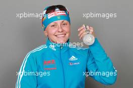 18.03.2011, Khanty-Mansiysk, Russia (RUS): Oksana Khvostenko (UKR), Fischer, Salomon, Swix - IBU world championships biathlon, medals, Khanty-Mansiysk (RUS). www.xpb.cc. © Manzoni/xpb.cc. Every downloaded picture is fee-liable.
