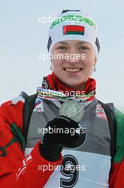 12.03.2011, Khanty-Mansiysk, Russia (RUS): Darya Domracheva (BLR), Fischer, Rottefella, Swix - IBU world championships biathlon, medals, Khanty-Mansiysk (RUS). www.xpb.cc. © Manzoni/xpb.cc. Every downloaded picture is fee-liable.