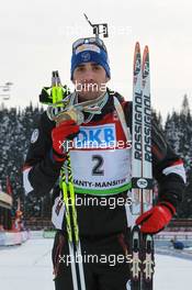 06.03.2011, Khanty-Mansiysk, Russia (RUS): Martin Fourcade (FRA), Rossignol, Rottefella, OneWay, Odlo - IBU world championships biathlon, medals, Khanty-Mansiysk (RUS). www.xpb.cc. © Manzoni/xpb.cc. Every downloaded picture is fee-liable.