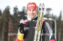 03.03.2011, Khanty-Mansiysk, Russia (RUS): Arnd Peiffer (GER), Fischer, Salomon, Swix, adidas - IBU world championships biathlon, medals, Khanty-Mansiysk (RUS). www.xpb.cc. © Manzoni/xpb.cc. Every downloaded picture is fee-liable.