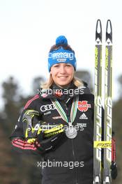 03.03.2011, Khanty-Mansiysk, Russia (RUS): Magdalena Neuner (GER), Fischer, Rottefella, Exel, adidas - IBU world championships biathlon, medals, Khanty-Mansiysk (RUS). www.xpb.cc. © Manzoni/xpb.cc. Every downloaded picture is fee-liable.