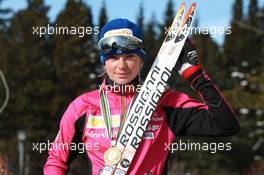 03.03.2011, Khanty-Mansiysk, Russia (RUS): Marie Dorin (FRA), Rossignol, Rottefella, OneWay - IBU world championships biathlon, medals, Khanty-Mansiysk (RUS). www.xpb.cc. © Manzoni/xpb.cc. Every downloaded picture is fee-liable.