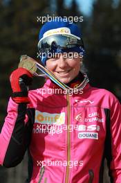 03.03.2011, Khanty-Mansiysk, Russia (RUS): Marie Dorin (FRA), Rossignol, Rottefella, OneWay - IBU world championships biathlon, medals, Khanty-Mansiysk (RUS). www.xpb.cc. © Manzoni/xpb.cc. Every downloaded picture is fee-liable.