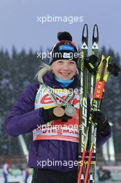 06.03.2011, Khanty-Mansiysk, Russia (RUS): Kaisa Maekaeraeinen (FIN), Fischer, Rottefella, Leki, Odlo - IBU world championships biathlon, medals, Khanty-Mansiysk (RUS). www.xpb.cc. © Manzoni/xpb.cc. Every downloaded picture is fee-liable.