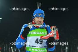 08.03.2011, Khanty-Mansiysk, Russia (RUS): Maxim Maksimov (RUS), Madshus, Rottefella, Swix, adidas - IBU world championships biathlon, medals, Khanty-Mansiysk (RUS). www.xpb.cc. © Manzoni/xpb.cc. Every downloaded picture is fee-liable.