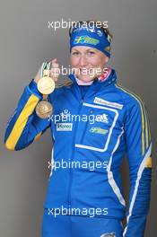 18.03.2011, Khanty-Mansiysk, Russia (RUS): Helena Ekholm (SWE), Fischer, Rottefella, Leki, adidas - IBU world championships biathlon, medals, Khanty-Mansiysk (RUS). www.xpb.cc. © Manzoni/xpb.cc. Every downloaded picture is fee-liable.