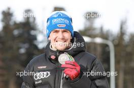 03.03.2011, Khanty-Mansiysk, Russia (RUS): Michael Greis (GER), Madshus, Rottefella, OneWay, adidas - IBU world championships biathlon, medals, Khanty-Mansiysk (RUS). www.xpb.cc. © Manzoni/xpb.cc. Every downloaded picture is fee-liable.