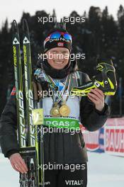 12.03.2011, Khanty-Mansiysk, Russia (RUS): Tora Berger (NOR), Fischer, Rottefella, Odlo - IBU world championships biathlon, medals, Khanty-Mansiysk (RUS). www.xpb.cc. © Manzoni/xpb.cc. Every downloaded picture is fee-liable.
