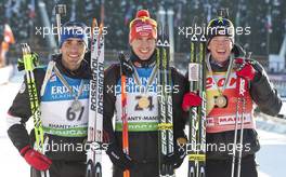 05.03.2011, Khanty-Mansiysk, Russia (RUS): (L-R): Martin Fourcade (FRA), Rossignol, Rottefella, OneWay, Odlo, Arnd Peiffer (GER), Fischer, Salomon, Swix, adidas, Tarjei Boe (NOR), Fischer, Rottefella, Swix, ODLO - IBU world championships biathlon, medals, Khanty-Mansiysk (RUS). www.xpb.cc. Â© Miko/xpb.cc. Every downloaded picture is fee-liable.