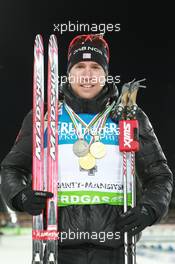 12.03.2011, Khanty-Mansiysk, Russia (RUS): Emil Hegle Svendsen (NOR), Madshus, Rottefella, Swix, Odlo - IBU world championships biathlon, medals, Khanty-Mansiysk (RUS). www.xpb.cc. © Manzoni/xpb.cc. Every downloaded picture is fee-liable.