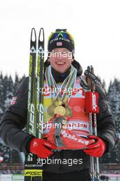 06.03.2011, Khanty-Mansiysk, Russia (RUS): Tarjei Boe (NOR), Fischer, Rottefella, Swix, ODLO - IBU world championships biathlon, medals, Khanty-Mansiysk (RUS). www.xpb.cc. © Manzoni/xpb.cc. Every downloaded picture is fee-liable.