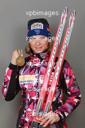 18.03.2011, Khanty-Mansiysk, Russia (RUS): Anais Bescond (FRA), Madshus, Rottefella, Swix, OneWay - IBU world championships biathlon, medals, Khanty-Mansiysk (RUS). www.xpb.cc. © Manzoni/xpb.cc. Every downloaded picture is fee-liable.