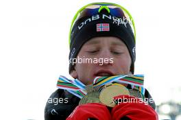 06.03.2011, Khanty-Mansiysk, Russia (RUS): Tarjei Boe (NOR), Fischer, Rottefella, Swix, ODLO - IBU world championships biathlon, medals, Khanty-Mansiysk (RUS). www.xpb.cc. © Manzoni/xpb.cc. Every downloaded picture is fee-liable.