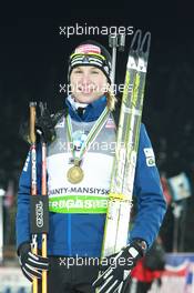 05.03.2011, Khanty-Mansiysk, Russia (RUS): Anastasiya Kuzmina (SVK), Fischer, Salomon, Exel - IBU world championships biathlon, medals, Khanty-Mansiysk (RUS). www.xpb.cc. © Manzoni/xpb.cc. Every downloaded picture is fee-liable.