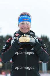 13.03.2011, Khanty-Mansiysk, Russia (RUS): Magdalena Neuner (GER), Fischer, Rottefella, Exel, adidas - IBU world championships biathlon, medals, Khanty-Mansiysk (RUS). www.xpb.cc. © Manzoni/xpb.cc. Every downloaded picture is fee-liable.