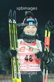 05.03.2011, Khanty-Mansiysk, Russia (RUS): Kaisa Maekaeraeinen (FIN), Fischer, Rottefella, Leki, Odlo - IBU world championships biathlon, medals, Khanty-Mansiysk (RUS). www.xpb.cc. © Manzoni/xpb.cc. Every downloaded picture is fee-liable.